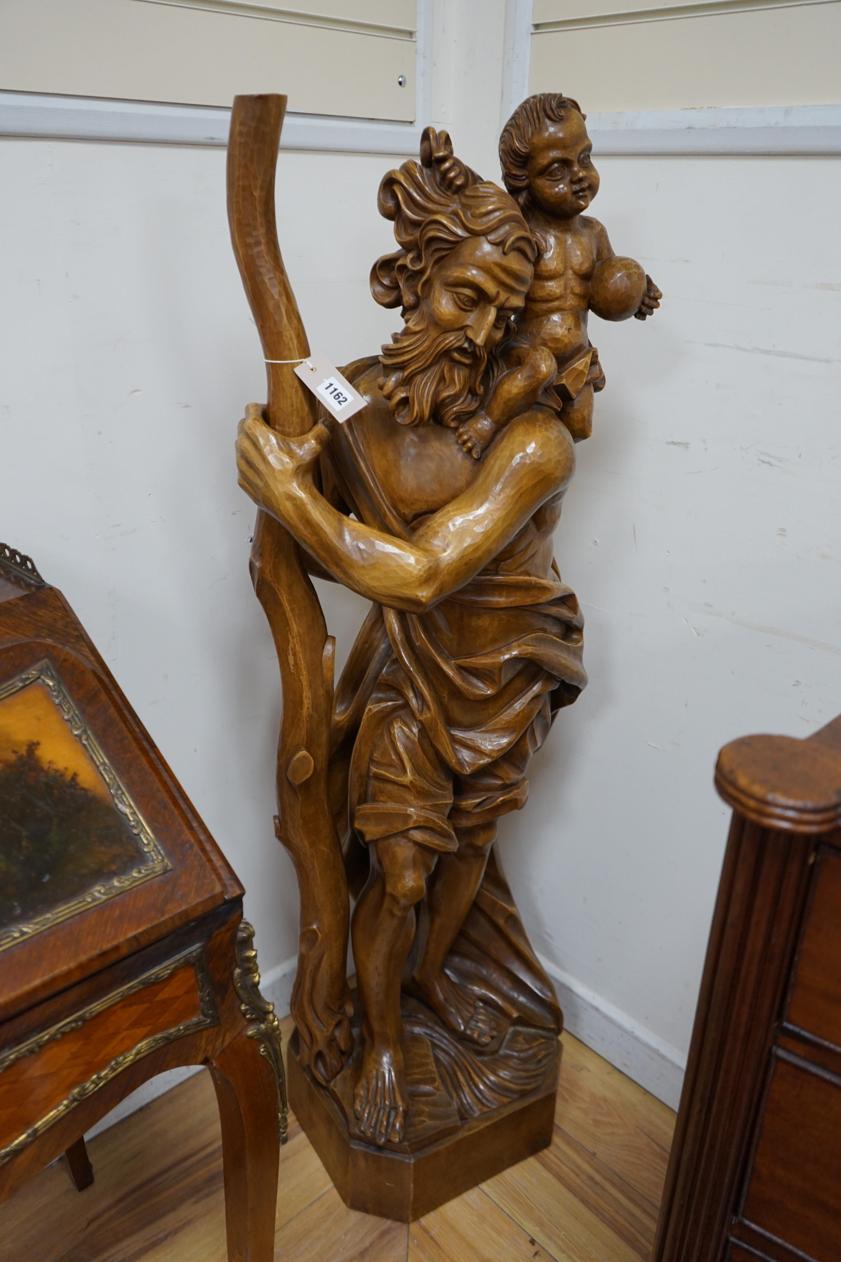 A large carved wood figure of St. Christopher, height 134cm